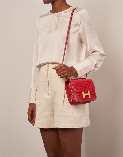 red hermes mini constance|hermès constance long to go.